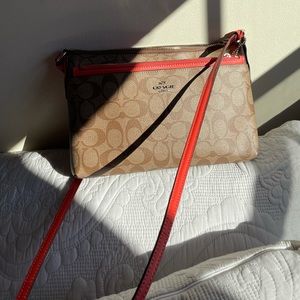 Coach Crossbody purse- Browns/ Bright Orange Strap, multi pocket